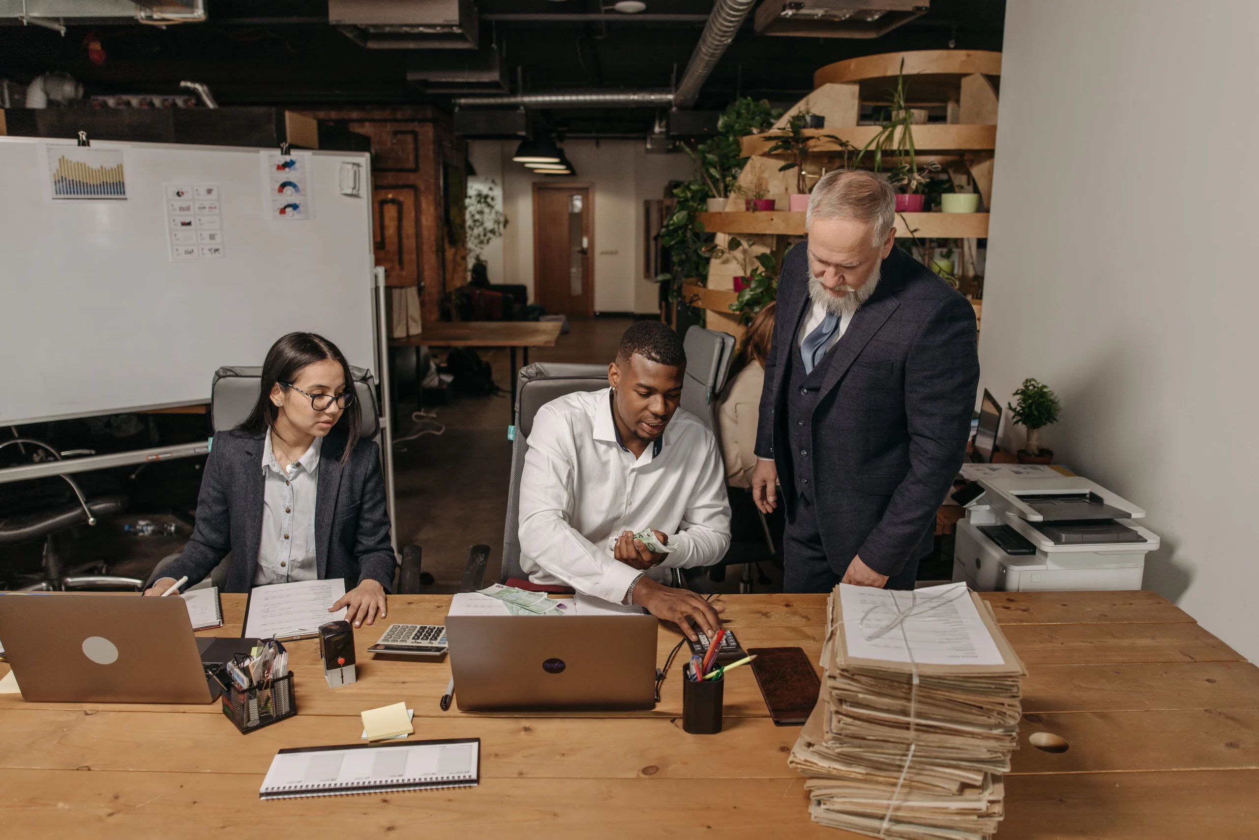 What Does a Part-Time CFO Do while helping a small business owner review financial reports and business growth strategies